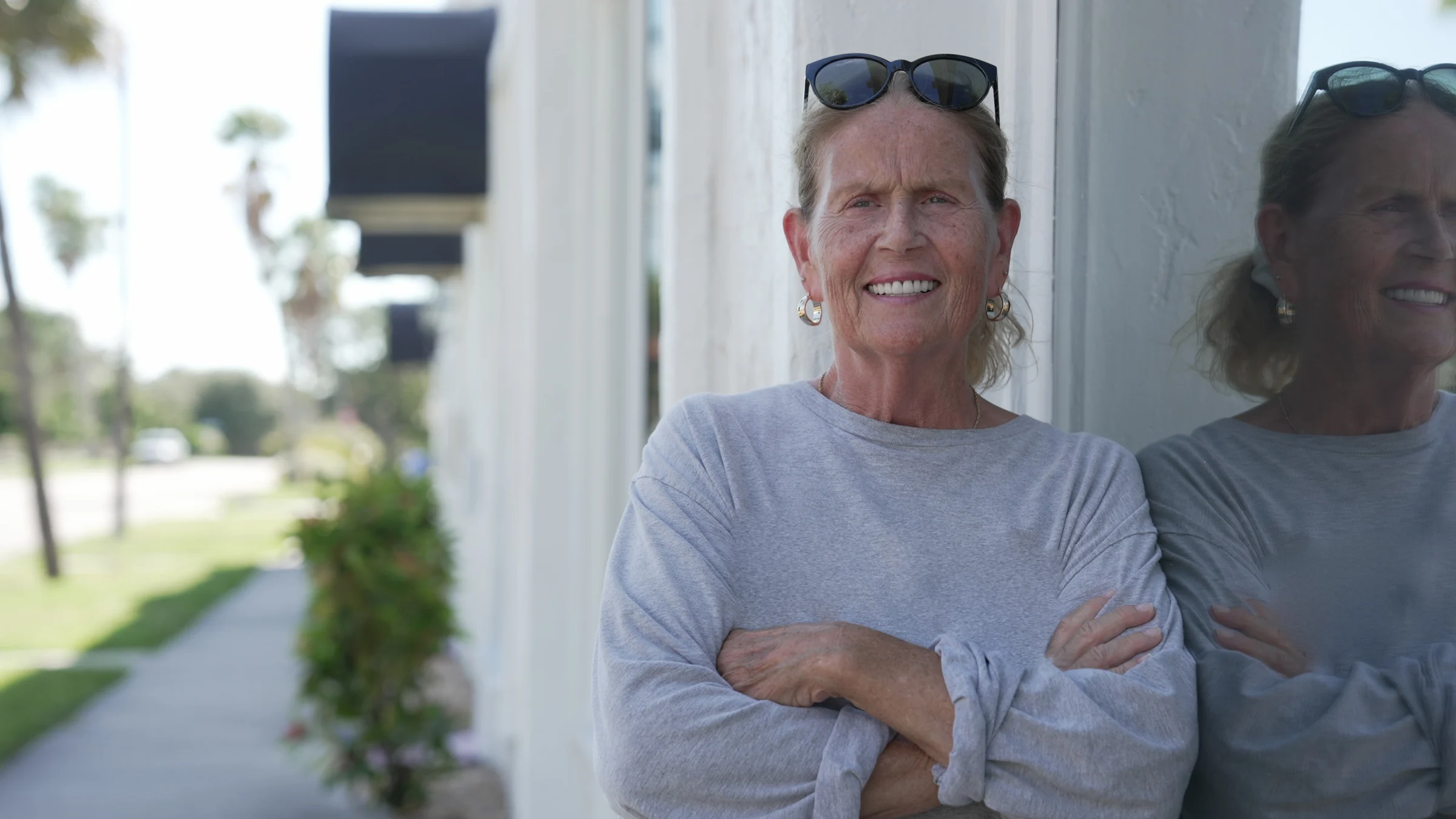 Smiling single-tooth implant patient in Venice, FL — Smile Spot Dentistry